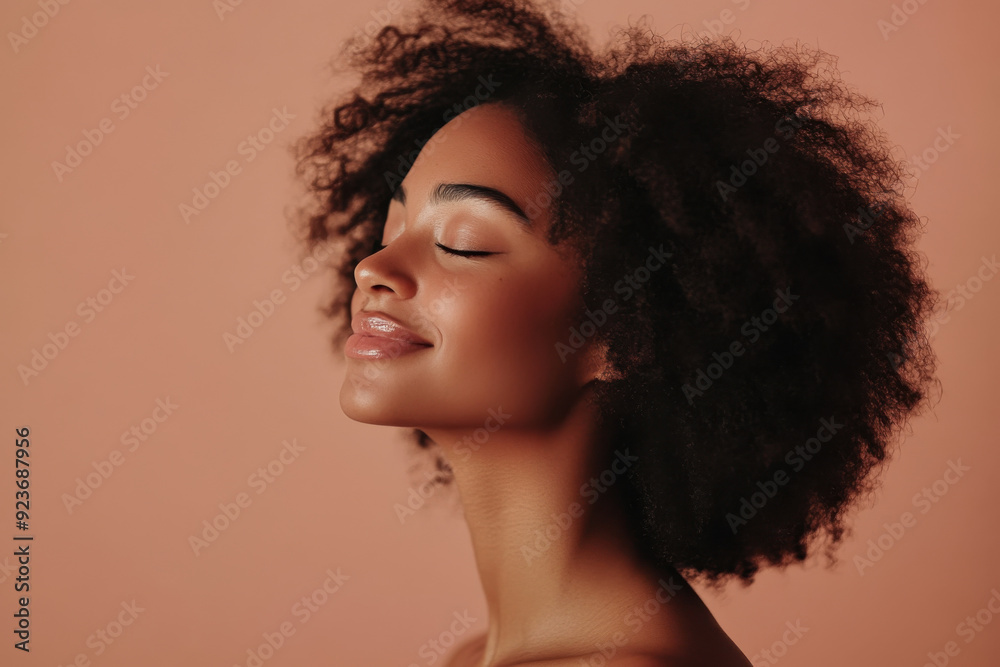 A close up of a black woman's face with her eyes closed A close up of a black woman's face with her eyes closed