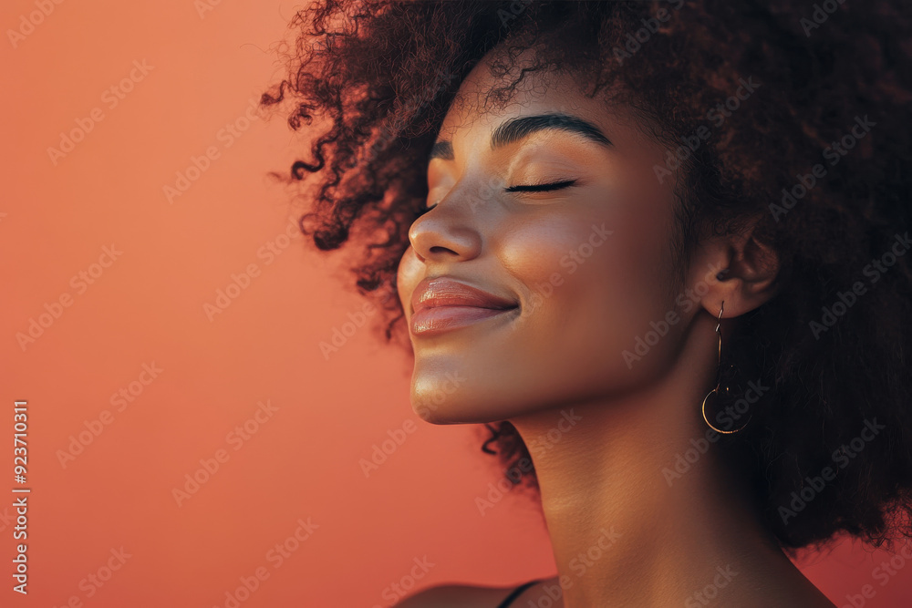 A close up of a black woman's face with her eyes closed A close up of a black woman's face with her eyes closed