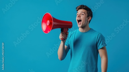 The young man with megaphone photo