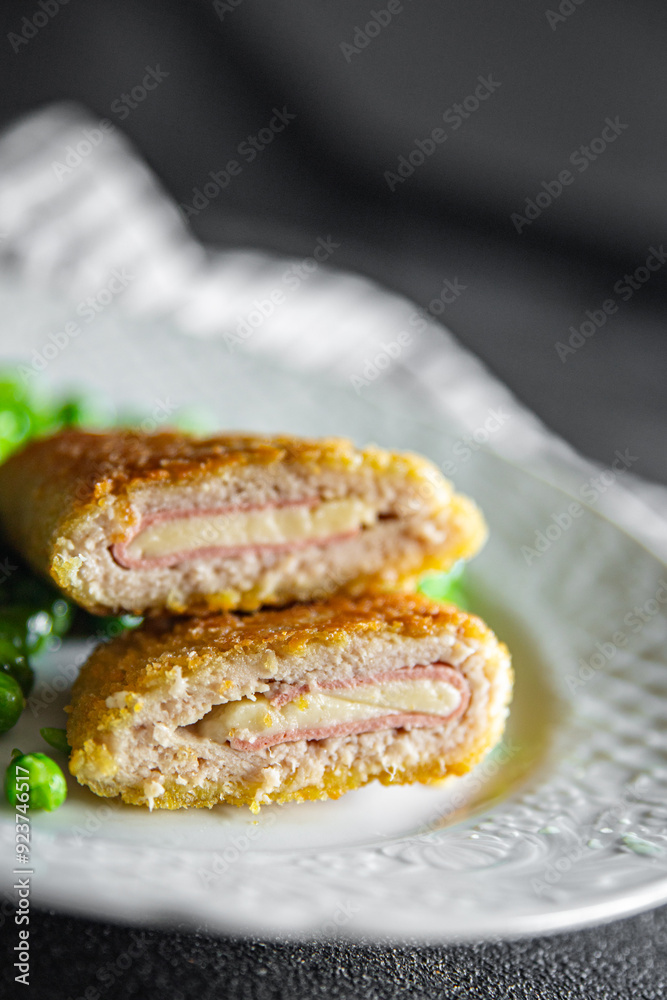 meat cutlet cordon bleu chicken, cheese, bacon meal snack on the table copy space food background rustic top view meat cutlet cordon bleu chicken, cheese, bacon meal snack on the table copy space food background rustic top view