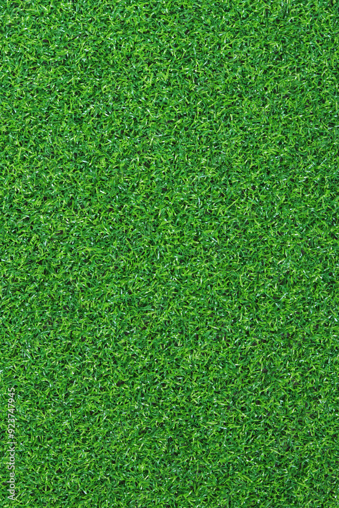 Fototapeta premium Artificial green grass mat, top view. Texture. Artificial turf, surface made of synthetic fibers. Flat green grass texture background. Short artificial grass golf surface