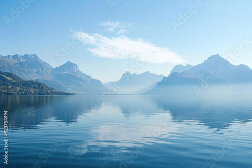 Klarer Bergsee mit Spiegelung unter blauem Himmel,  lake with mountains in the background, 
