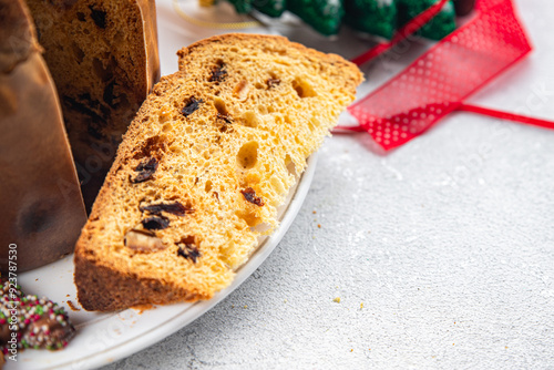 Panettone christmas cake baked sweet goods Christmas background New Year's holiday meal food snack on the table copy space food background rustic top view