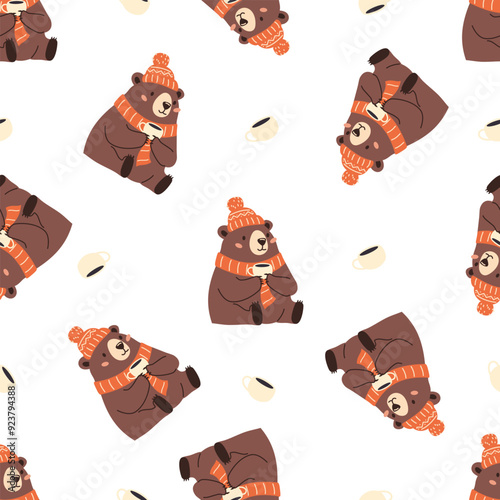 Seamless vector pattern. Cute bear in scarf and hat drinking tea. Cute winter New Year illustration . Vector illustration