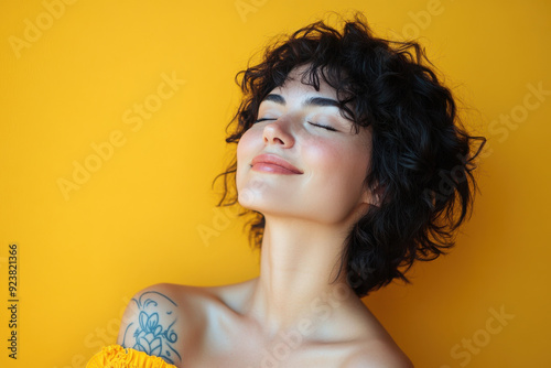 A close up of a woman's face with tattoos and her eyes closed