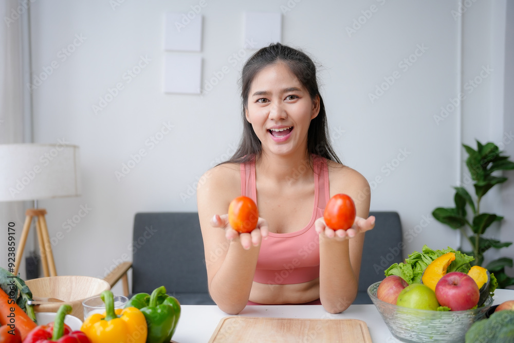 Nutritionist is holding two tomatoes while making a healthy food recommendation during an online consultation Nutritionist is holding two tomatoes while making a healthy food recommendation during an online consultation