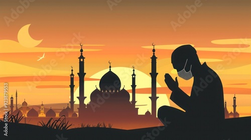 Silhouette of a Muslim man praying against the background of a mosque photo