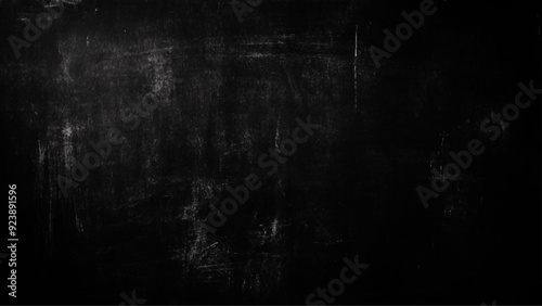 Black texture chalk board and black board background.,  Scary dark wall, low light black concrete cement 