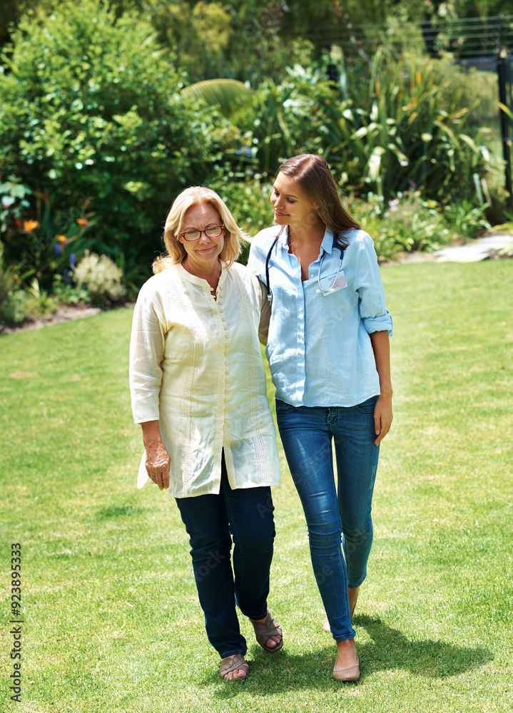 Assisted living, garden or walking with nurse and old woman outdoor on lawn together for mobility exercise. Conversation, healthcare or medical with caregiver and senior patient on grass for fitness Assisted living, garden or walking with nurse and old woman outdoor on lawn together for mobility exercise. Conversation, healthcare or medical with caregiver and senior patient on grass for fitness