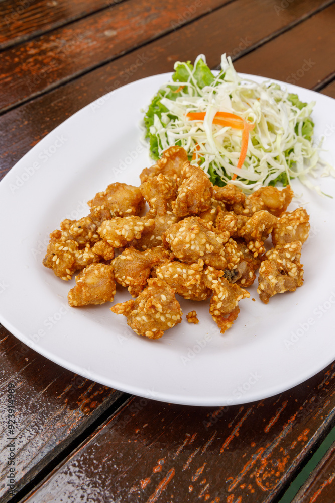 Chicken ligaments fried with chili sauce, Thai food Chicken ligaments fried with chili sauce, Thai food