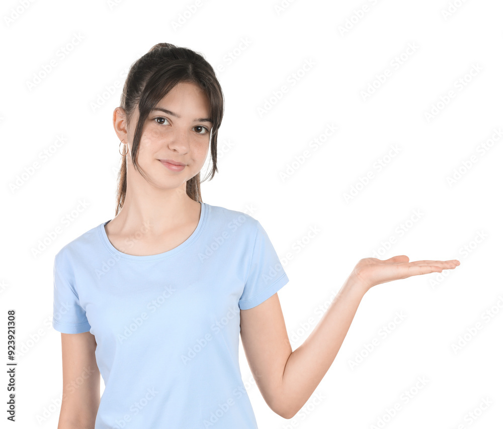 Portrait of cute teenage girl holding something on white background Portrait of cute teenage girl holding something on white background