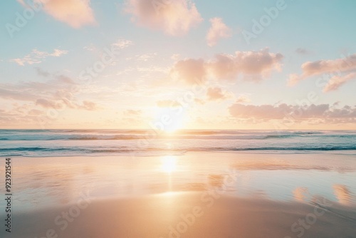 Tranquil beach sunset with soft golden hues