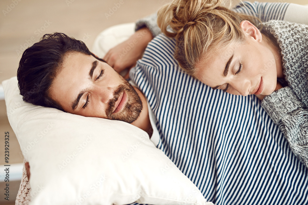 Couple, rest and hug together on sofa to relax, sleeping and cuddle in marriage, relationship or love for partner. Tired, man and woman dreaming with peace in home, house or living room in morning Couple, rest and hug together on sofa to relax, sleeping and cuddle in marriage, relationship or love for partner. Tired, man and woman dreaming with peace in home, house or living room in morning
