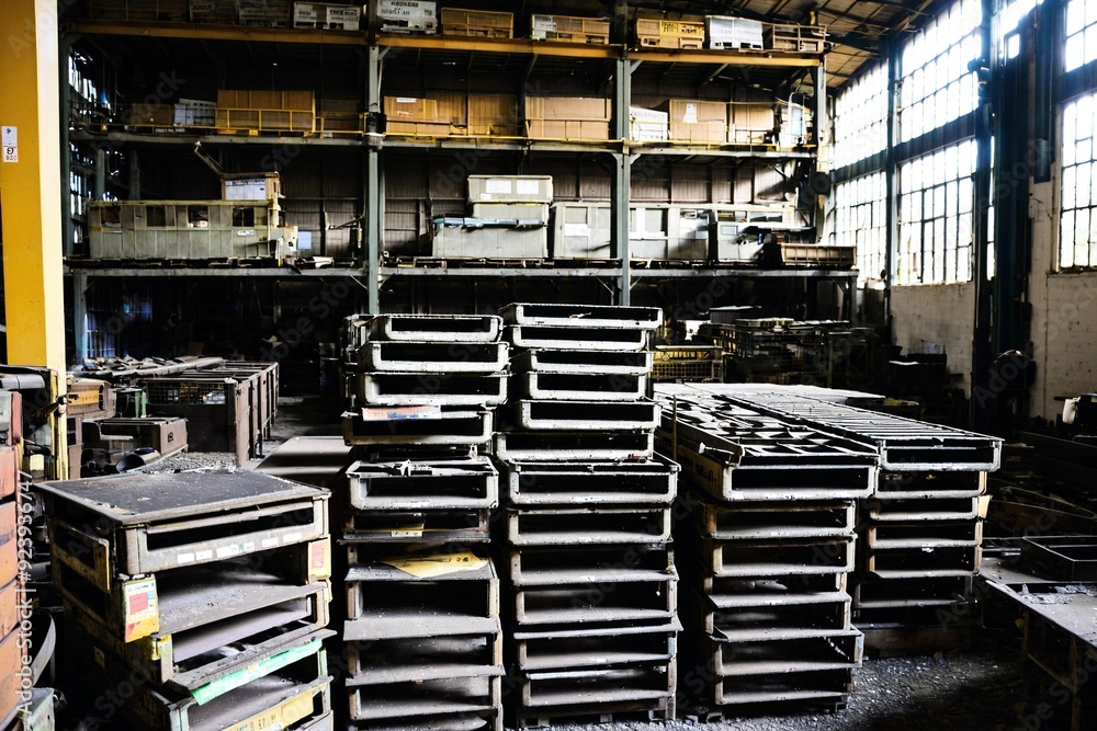 Warehouse storage facility filled with wooden pallets, suitable for industrial or commercial use Warehouse storage facility filled with wooden pallets, suitable for industrial or commercial use