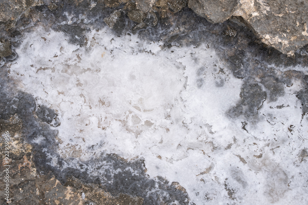 Fototapeta premium Haloclasty (also called salt weathering) is a type of physical weathering caused by the growth and thermal expansion of salt crystals. Kaʻena Point , North Shore, Oahu Hawaii. Keawaula Beach 