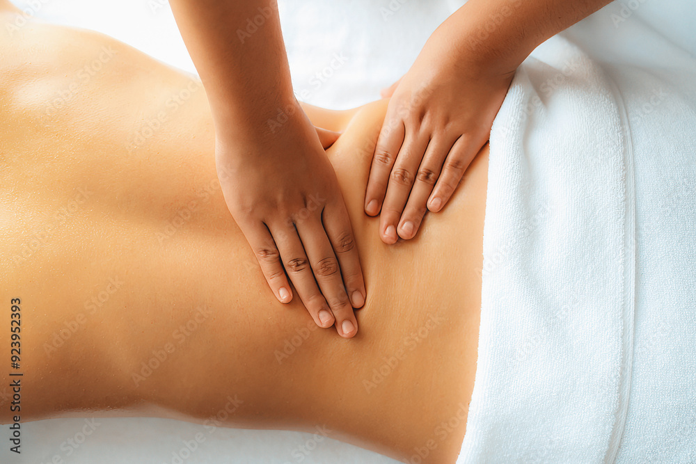 Closeup woman customer enjoying relaxing anti-stress spa massage and pampering with beauty skin recreation leisure in day light ambient salon spa at luxury resort or hotel. Quiescent Closeup woman customer enjoying relaxing anti-stress spa massage and pampering with beauty skin recreation leisure in day light ambient salon spa at luxury resort or hotel. Quiescent