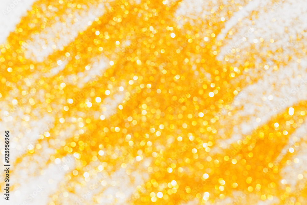 Abstract golden bokeh background. Defocused christmas lights. Party, holiday and festive concept Abstract golden bokeh background. Defocused christmas lights. Party, holiday and festive concept
