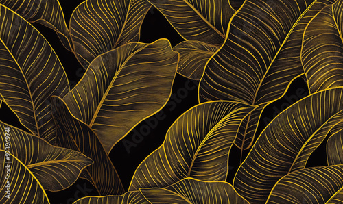 A gold leafy plant with a black background. The leaves are very detailed and the background is dark