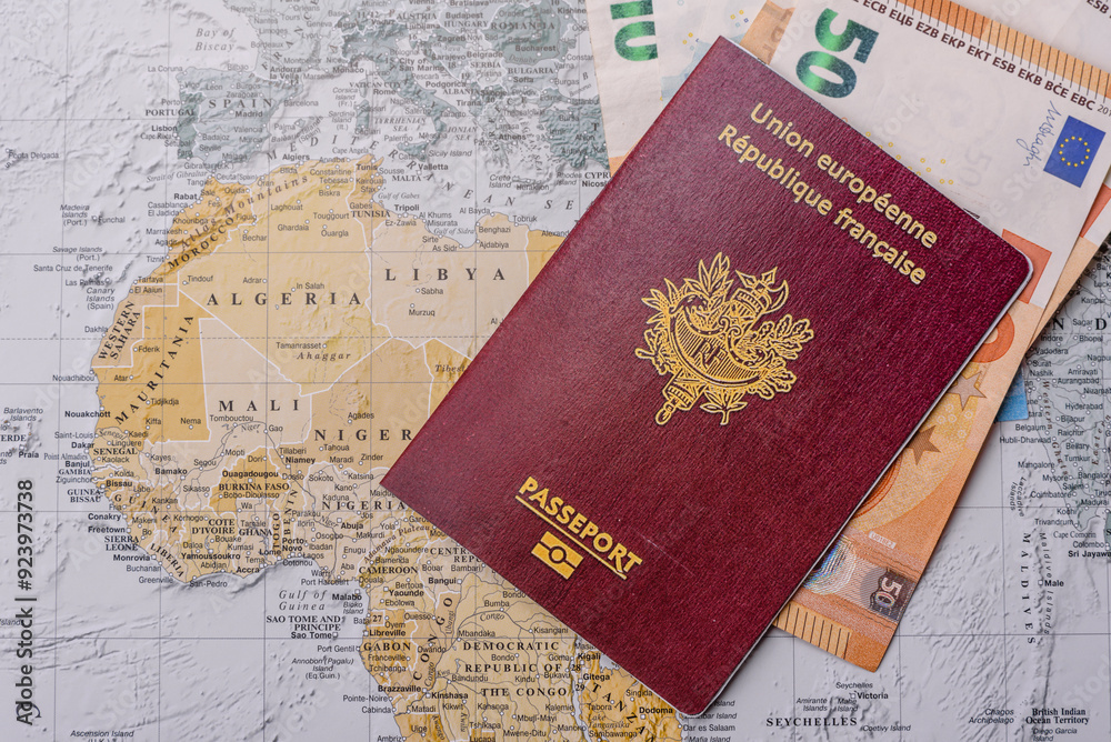 Conceptual background for travel with passport, magnifying glass, world map and money Conceptual background for travel with passport, magnifying glass, world map and money
