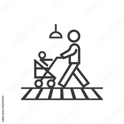 Person Pushing a Baby Stroller Across a Crosswalk