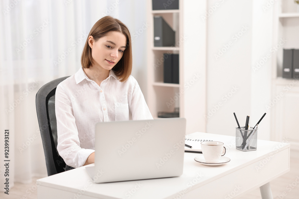 Teenager working with laptop at home. Remote job Teenager working with laptop at home. Remote job