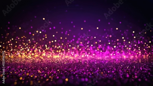 A mesmerizing array of colorful lights, predominantly pink and purple, shimmering on a dark surface, evoking a sense of festivity and elegance