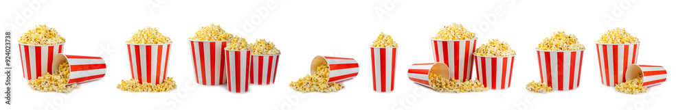 Popcorn box. Red and white striped buckets of salted popcorn isolated on white background. Cinema and entertainment concept. Movie night with popcorn. Delicious appetizer, snack. Popcorn box. Red and white striped buckets of salted popcorn isolated on white background. Cinema and entertainment concept. Movie night with popcorn. Delicious appetizer, snack.