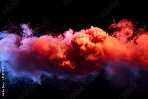 A dramatic burst of red smoke expands against a solid black background, creating a striking contrast. The swirling, cloud like formation captures the dynamic motion and intensity of the explosion.