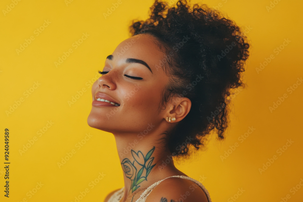 A close up of a woman's face with tattoos and her eyes closed
