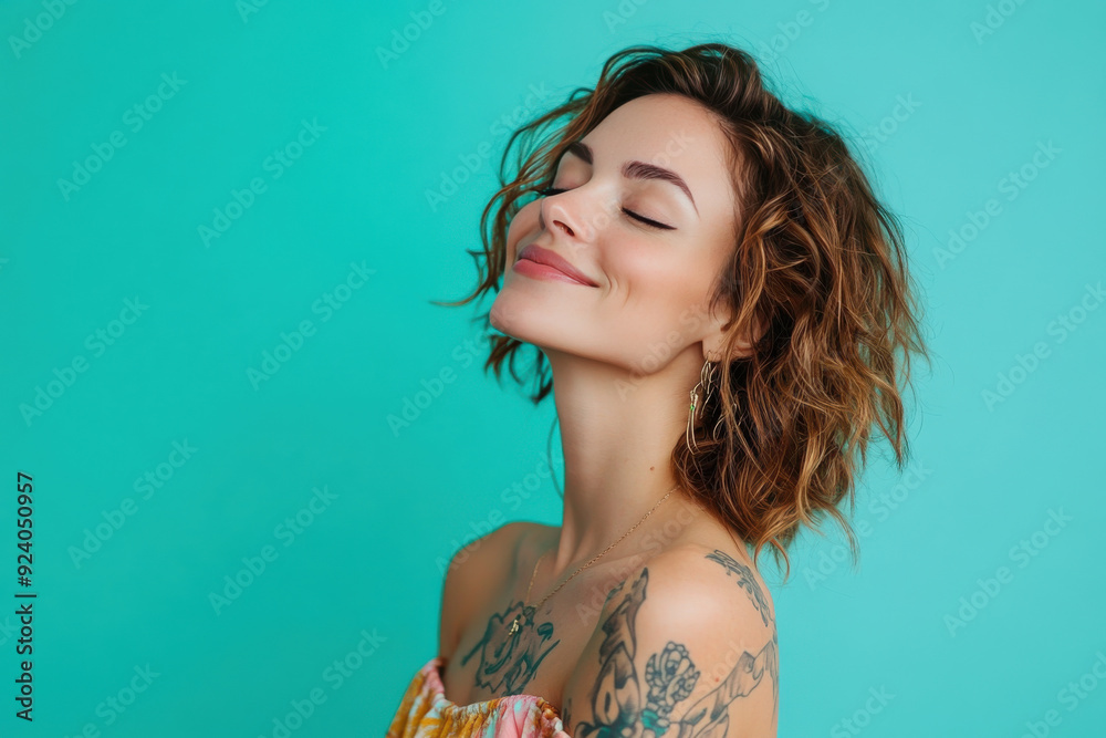 A close up of a woman's face with tattoos and her eyes closed A close up of a woman's face with tattoos and her eyes closed