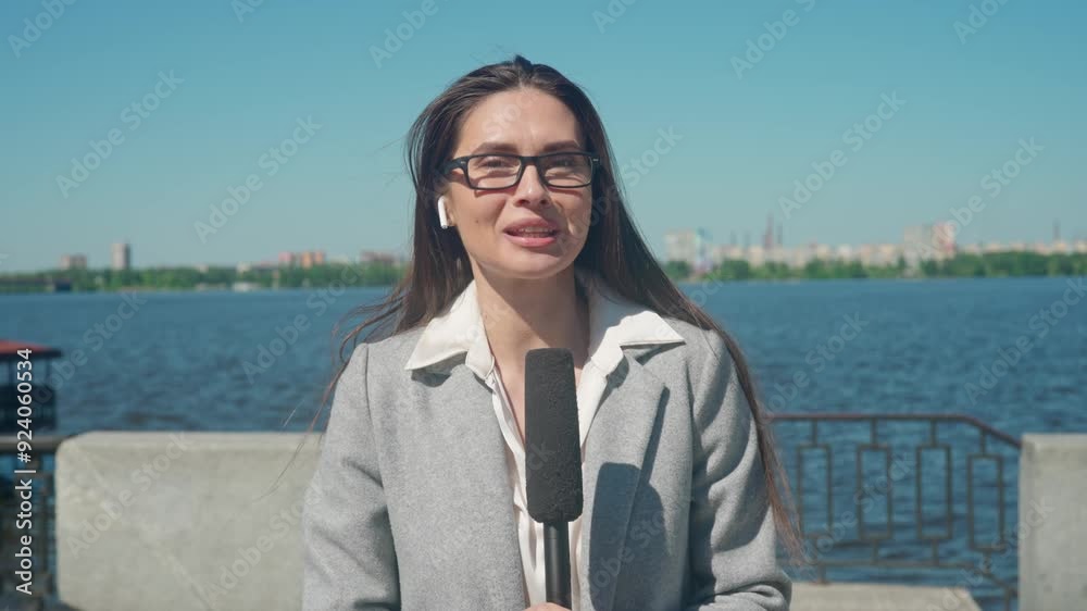 Reporter Delivers Live Segment by the Riverside