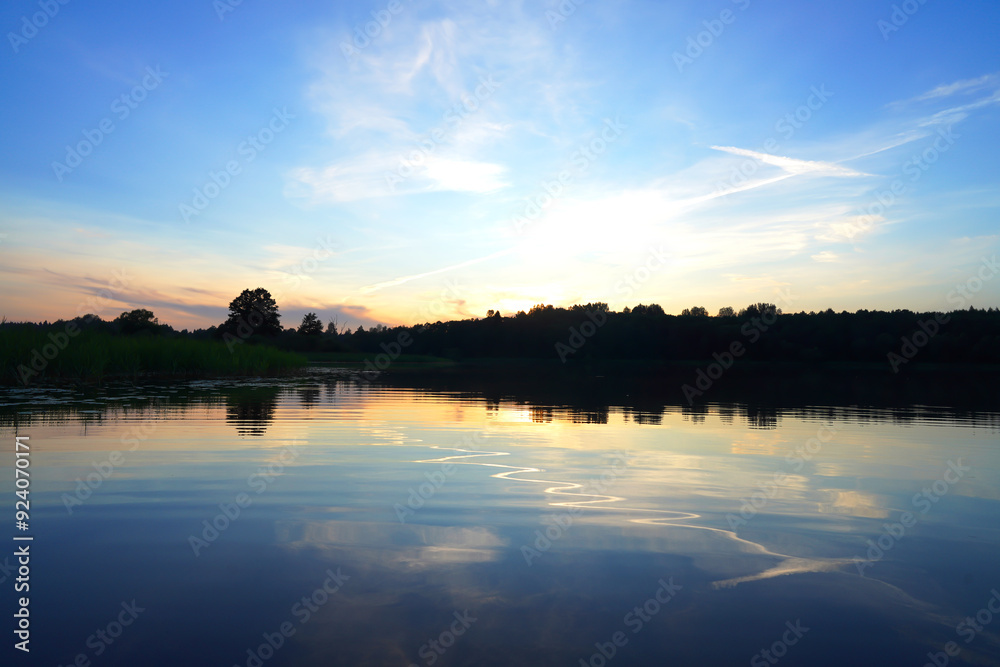 Sunset on the lake. Amazing sunset over the river. Sunset landscape. Sunset on the lake. Amazing sunset over the river. Sunset landscape.
