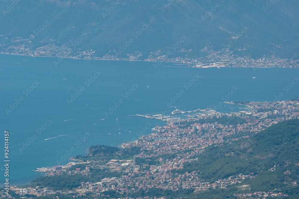 Obraz premium view from the top of the mountain on Boka bay in Montenegro on a sunny day. Adriatic Sea Bay seen from mountains.