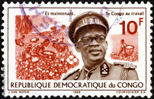 Postage stamp Congo 1965 President Mobutu Sese Seko (1930-1997) and cotton harvest