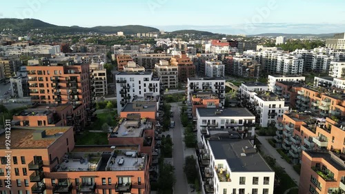 Drone video over Hasle, Oslo, with Løren in the background, one area with many new buildings, mostly housing