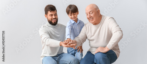 Happy man, his little son a...