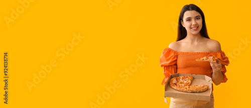 Young woman holding cardboa...