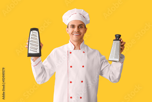 Handsome happy male chef wi...