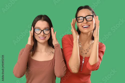 Young women in eyeglasses o...