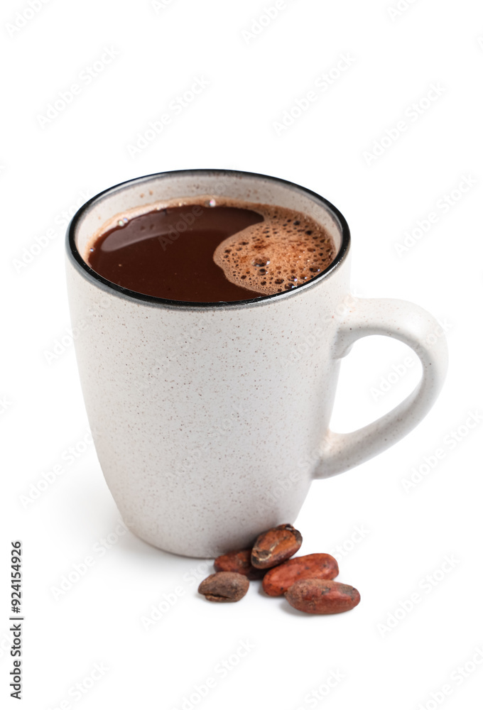 Fototapeta premium Cup of hot chocolate with cocoa beans on white background