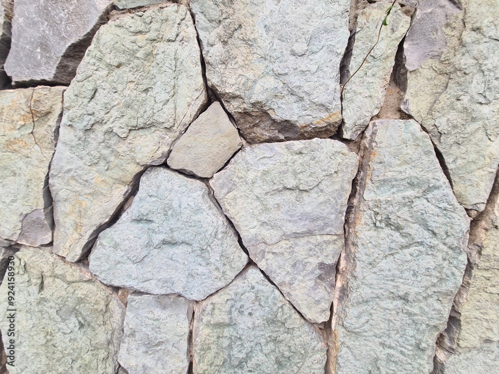 Obraz premium minimalistic stone wall paper background picture - detailled close up photography of a Wall in Tbilisi, Georgia