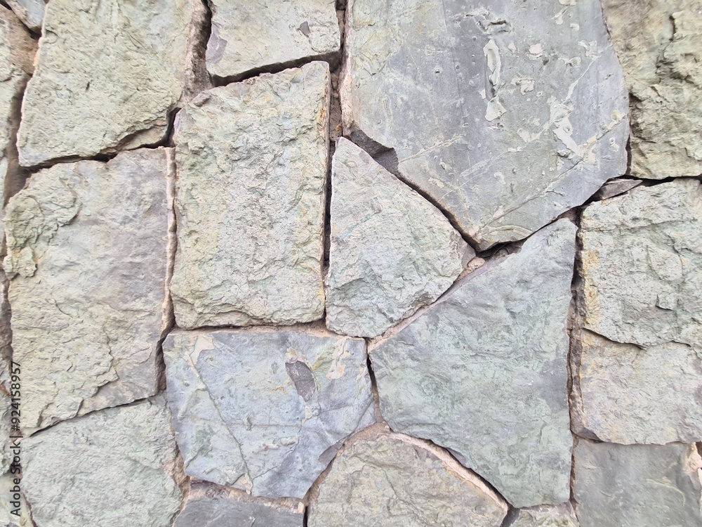 Obraz premium minimalistic stone wall paper background picture - detailled close up photography of a Wall in Tbilisi, Georgia