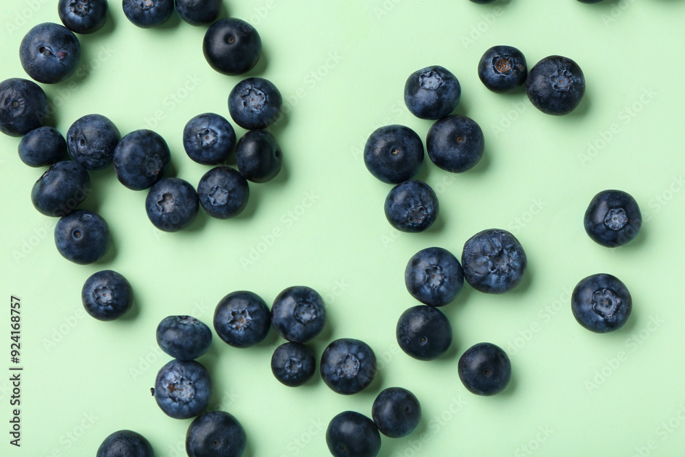 Sweet fresh blueberries on green background Sweet fresh blueberries on green background