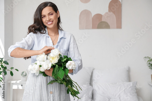 Beautiful young woman with ...