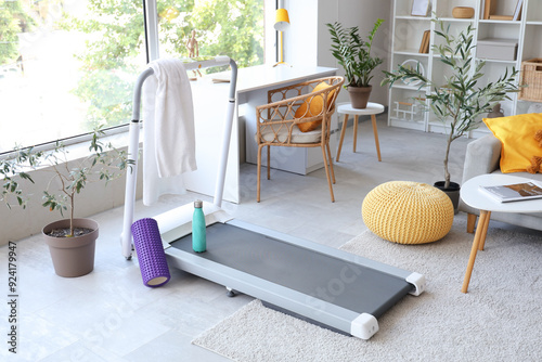 Treadmill with towel, water...