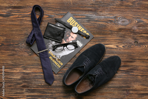 Magazine with male shoes an...