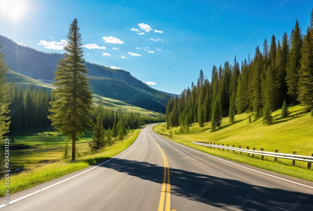 Winding Road Through a Lush Green Valley with Mountains in the Distance