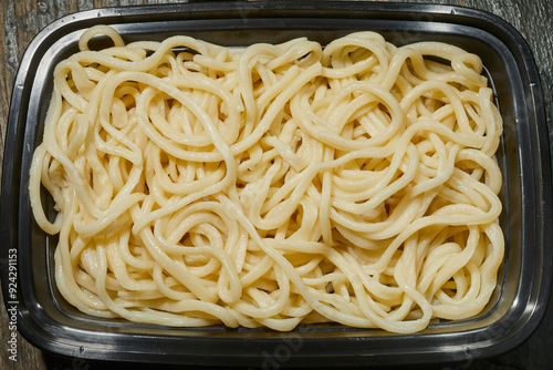 Photography A plastic container of Shanghai style noodles