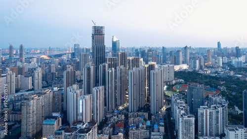Stunning Aerial View of a Modern City Skyline at Dusk