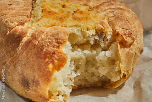 A backed potato knish from Knish Nosh in Rego Park, Queens, New York, USA photo